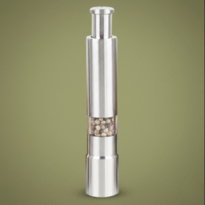 A single, brushed stainless steel pepper grinder with a clear viewing window, filled with white peppercorns, presented vertically against a solid olive green background.