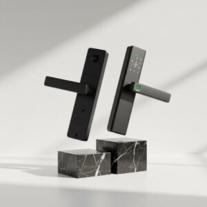 Two separate pieces of a black smart door lock (front and back panels) are shown levitating and tilted above two small, black marble blocks with white veins. Strong side light creates clear shadows