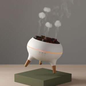 White volcano smoke ring diffuser levitating above a matte olive green block with smoke rings clearly visible.