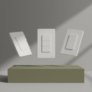 Three white smart switches (one-gang, two-gang, three-gang) are levitating and angled over a matte olive green block with a gray background.